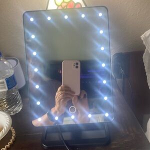 Lighted Make-Up Mirror with Blue Tooth. Screen rotates. Mirror 12” x 7.5”
